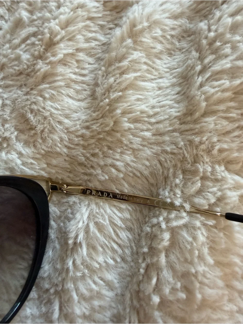 Prada Black Round Women's Sunglasses with Gold Accents